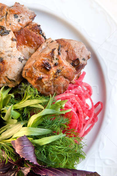 Stock photo: shashlik with potherbs on the plate