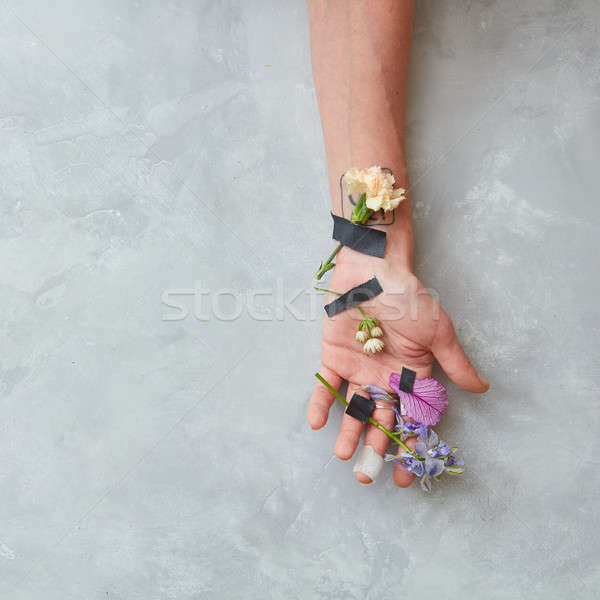 hand girl in flowers Stock photo © artjazz