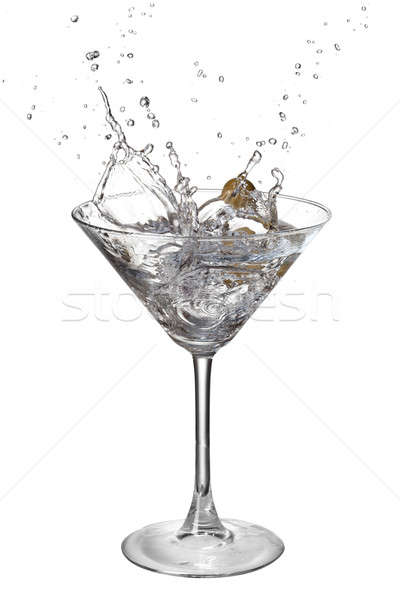 Martini with splash and olive isolated on white Stock photo © artjazz