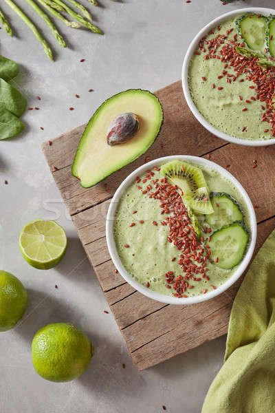 Top view of a green smoothie from avacado, cucumber, kiwi, aspar Stock photo © artjazz
