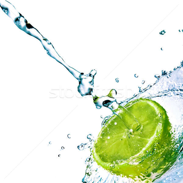 Stock photo: fresh water drops on lime isolated on white