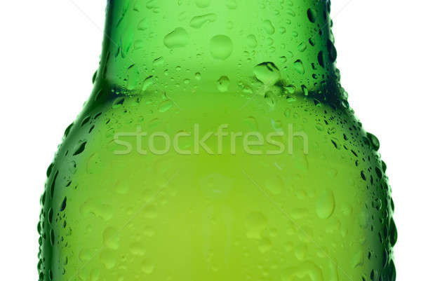 Green beer bottle with water drops isolated on white Stock photo © artjazz