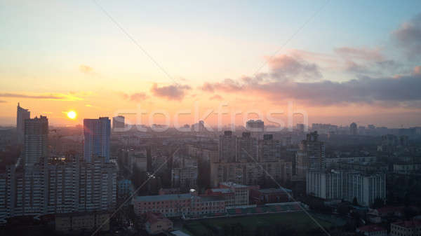 birdseye view of the city at sunrise Stock photo © artjazz