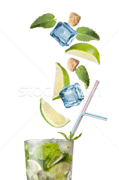 mohito cocktail with falling ingredients isolated on white Stock photo © artjazz