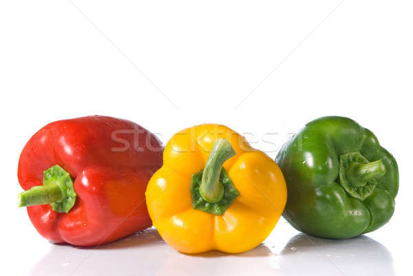 red, yellow and green pepper with water drops isolated on white Stock photo © artjazz