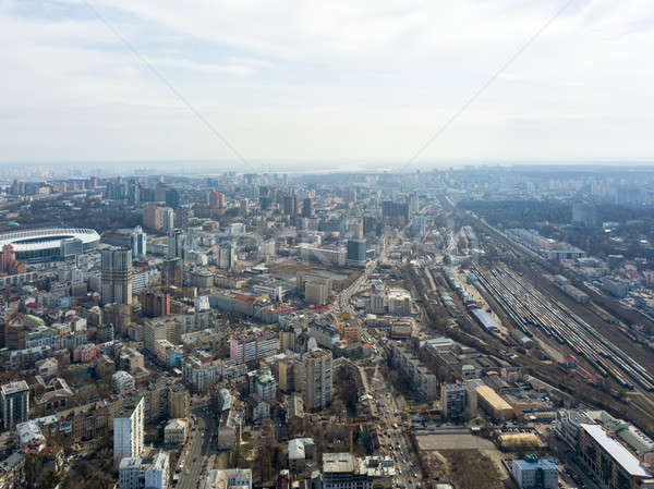 The city landscape with railroad tracks and the Olympic Sports Complex. Kiev, Ukraine Stock photo © artjazz