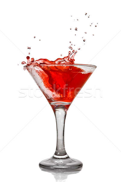 Red cocktail with splash isolated on white Stock photo © artjazz