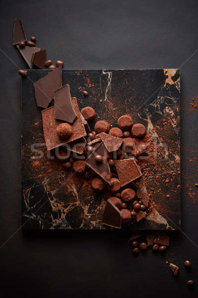 Assorted dark chocolate truffles Stock photo © artjazz