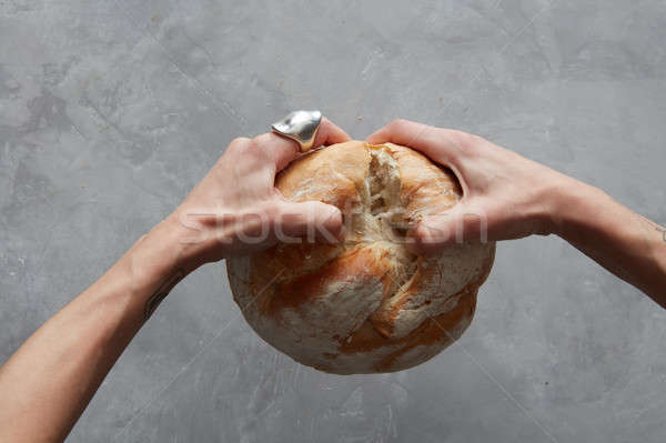hand breaking Bread Stock photo © artjazz
