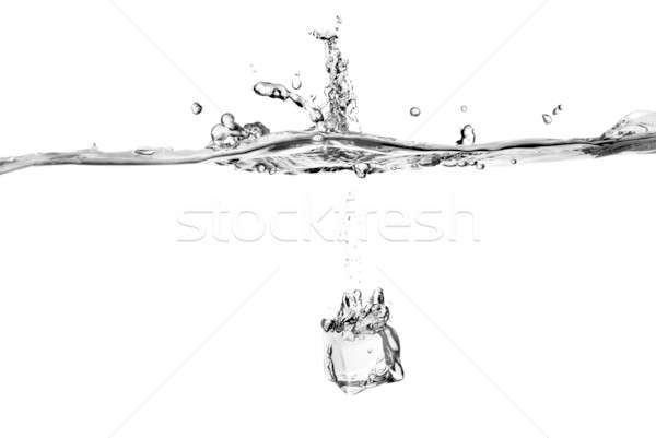 Ice Cube geïsoleerd witte water licht Stockfoto © artjazz