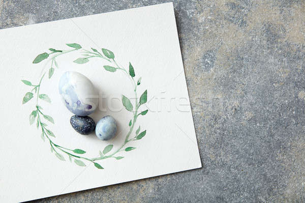 Paskalya yumurtası yaprakları kâğıt mavi suluboya çerçeve Stok fotoğraf © artjazz