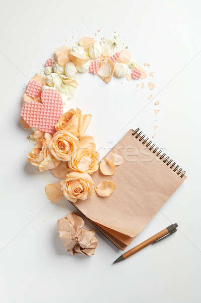 Roses and heart with notebook Stock photo © artjazz