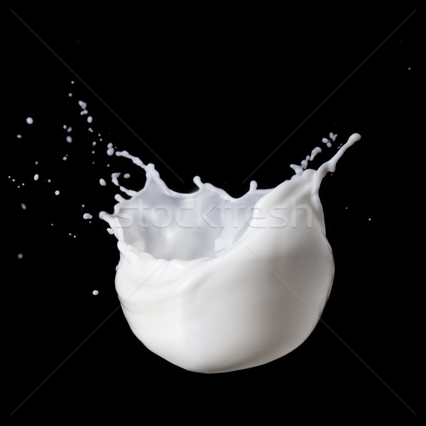 Melk splash geïsoleerd zwarte voedsel abstract Stockfoto © artjazz