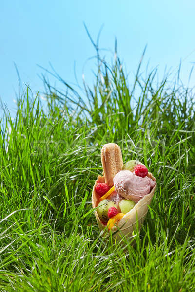 Fruit ice cream in waffle cone Stock photo © artjazz