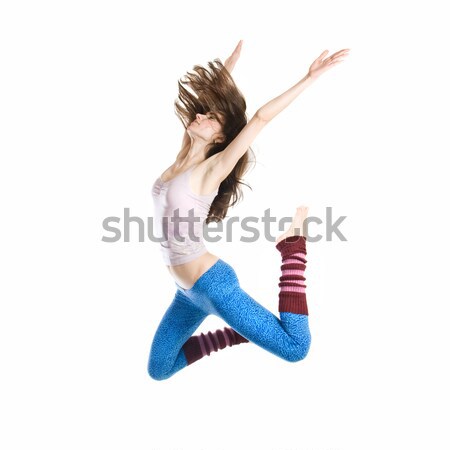 Jumping giovani ballerino isolato bianco donna Foto d'archivio © artjazz