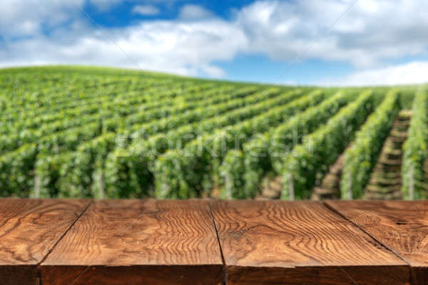 Stock photo: wooden table with vineyard landscape