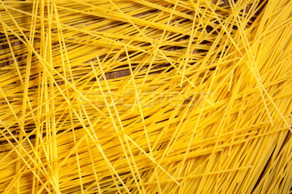 italian spaghetti on wooden background Stock photo © artjazz