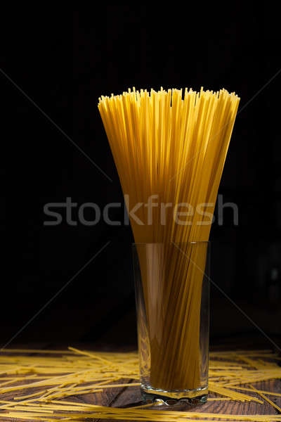 italian spaghetti on black Stock photo © artjazz