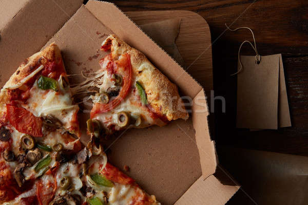 Pizza cartón caja de pizza rebanadas papel alimentos Foto stock © artjazz