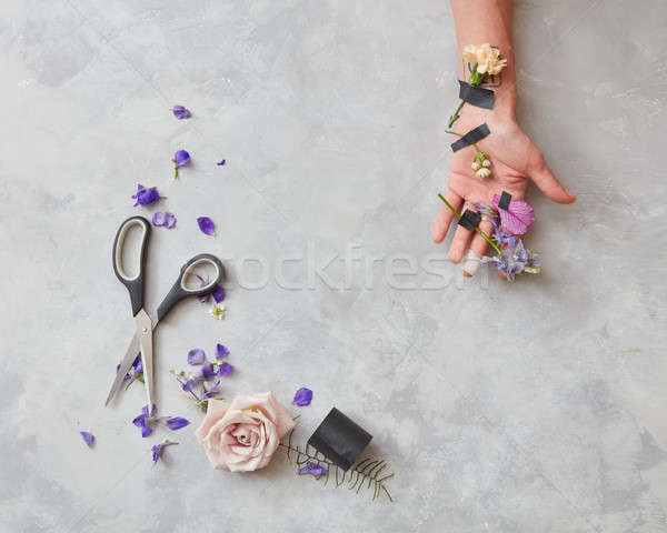 hand girl in flowers Stock photo © artjazz