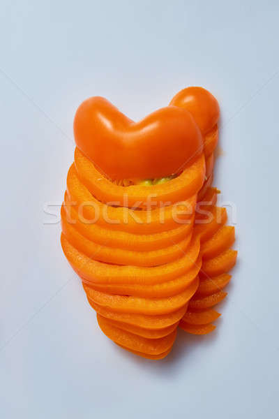 Stock photo: Half of chopped yellow pepper on a gray background