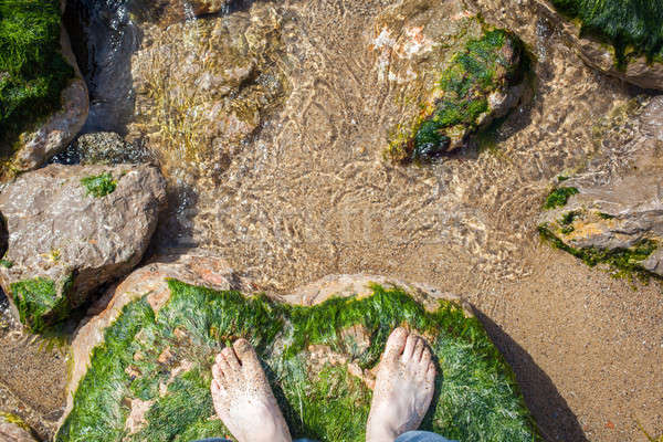 Stóp wody skał stóp plaży chłopców Zdjęcia stock © artjazz