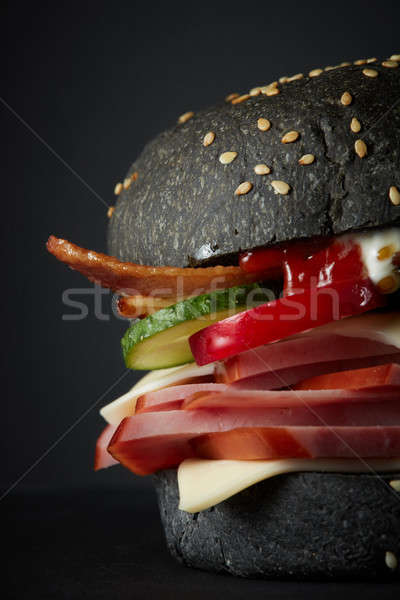 Gourmet black burger with Spicy sauce Stock photo © artjazz