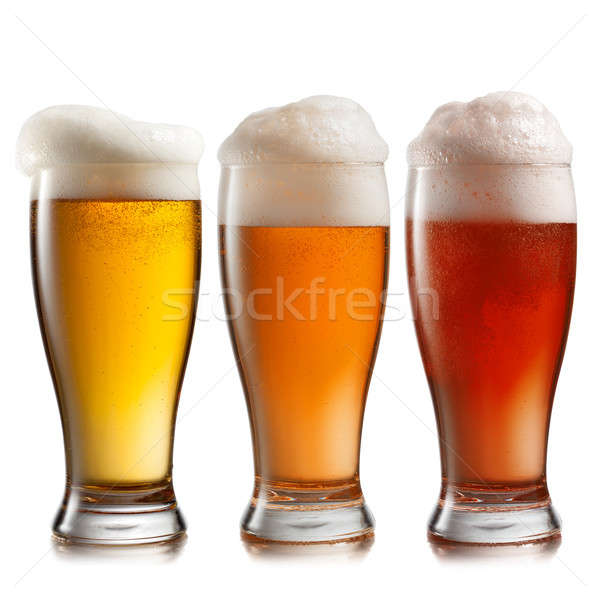 Different beer in glasses isolated on white background Stock photo © artjazz