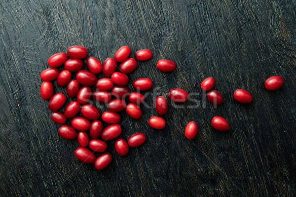 Dogwood berries as a broken heart Stock photo © artjazz