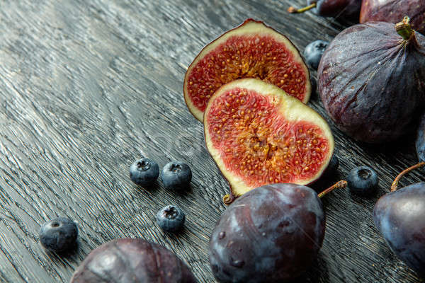 ripe berries and sliced figs Stock photo © artjazz