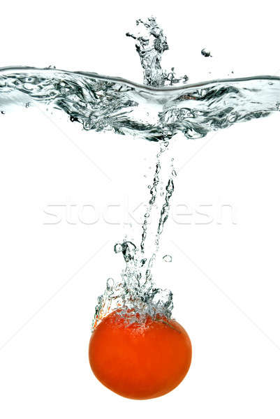 red tomato dropped into water isolated on white Stock photo © artjazz