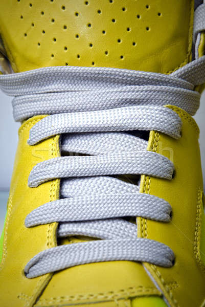 close-up laces on the yellow boots Stock photo © artjazz