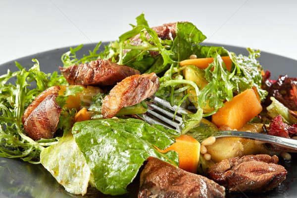 Overhead view of delicious, grilled meat duck Stock photo © artjazz