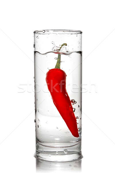 red pepper dropped into water glass with bubbles Stock photo © artjazz