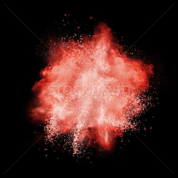Red powder explosion isolated on black Stock photo © artjazz
