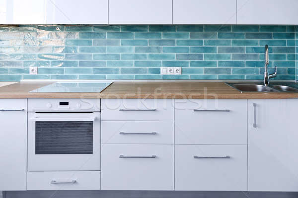 Modern white kitchen furniture Stock photo © artjazz