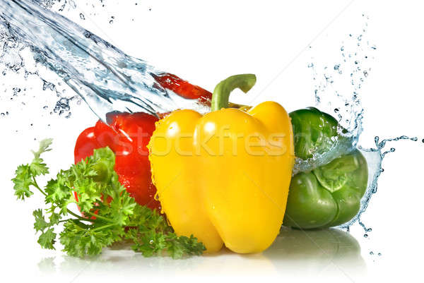 red, yellow, green pepper and parsley with water splash isolated Stock photo © artjazz