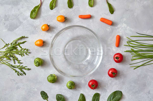 Varied vegetables and herbs ingredients for salad Stock photo © artjazz