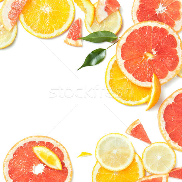 Közelkép friss citrus szeletek levél citrus gyümölcs Stock fotó © artjazz