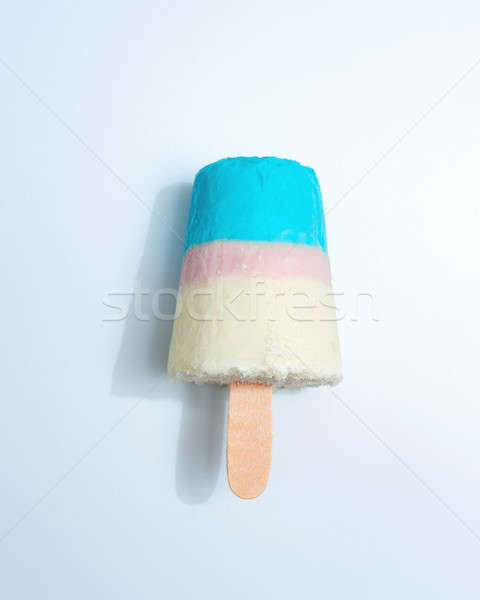 Multicolored appetizing ice cream lolly on a gray background with copy space. Top view Stock photo © artjazz