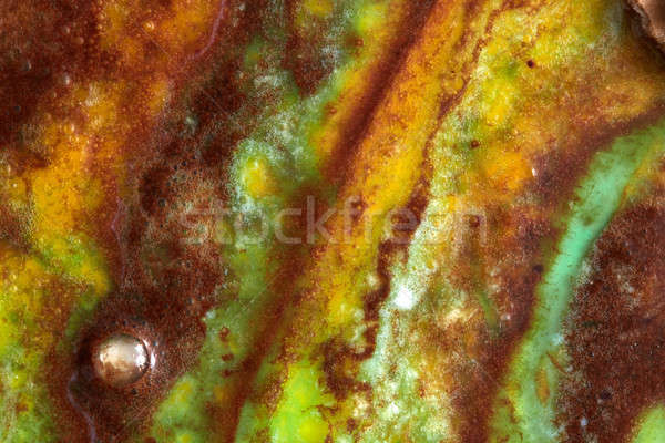 Stock photo: Close up background from multi colored melting ice crem - yellow