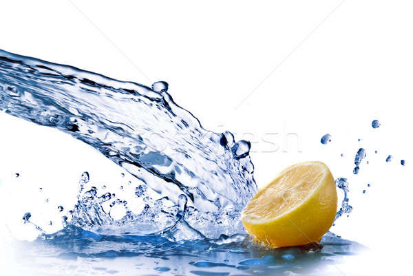fresh water drops on lemon isolated on white Stock photo © artjazz