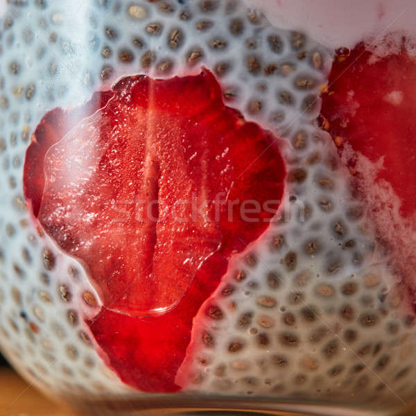 Dessert breakfast layered chia seeds pudding with strawberrie close up Stock photo © artjazz