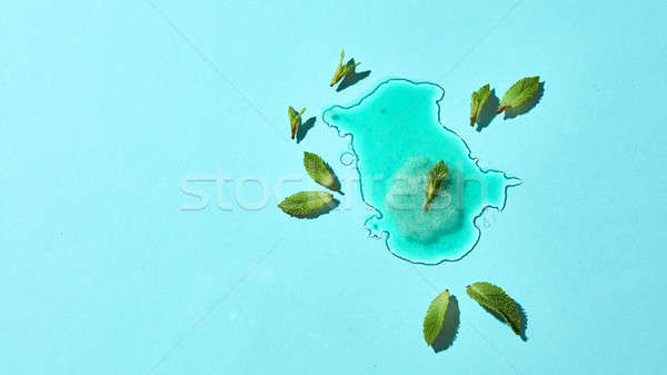 Plas gesmolten groene mint ijs bladeren Stockfoto © artjazz