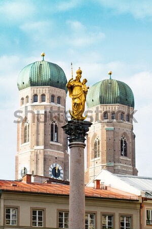 Stock photo: The Golden Mary's Column opposite the towers of the Cathedral of Our Dear Lady in Munich, Germany