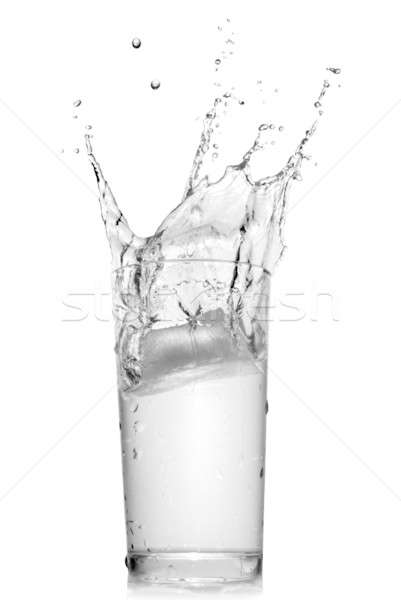 water splash in glass isolated on white Stock photo © artjazz