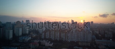 birdseye view of the city at sunrise Stock photo © artjazz