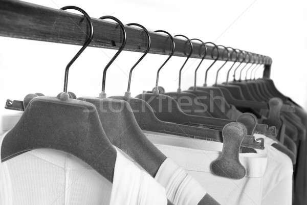 clothes on racks in store Stock photo © artjazz