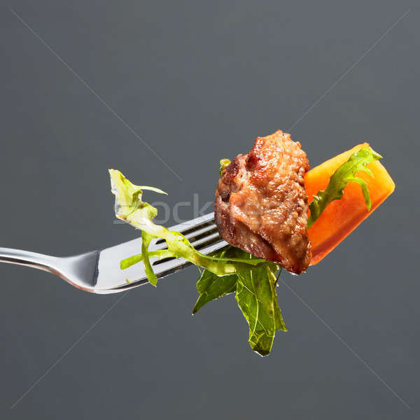 pumpkin, meat and salad on a fork Stock photo © artjazz