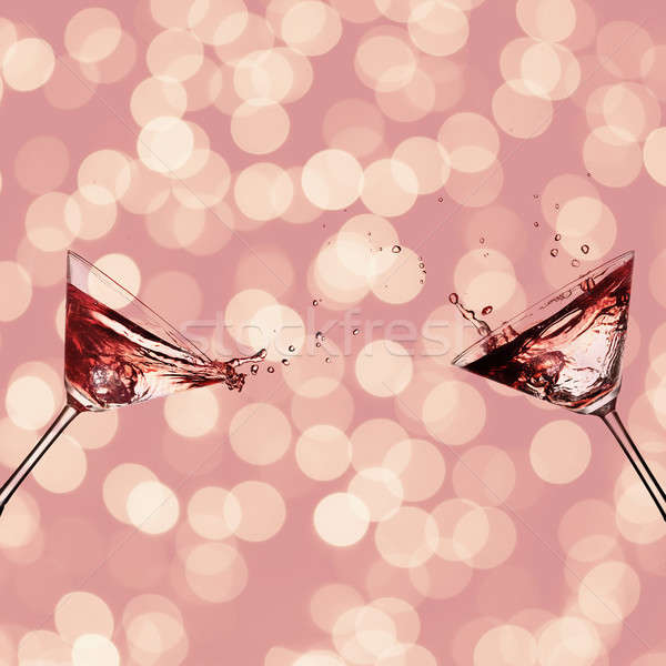 Deux verres cocktail martini Splash rose [[stock_photo]] © artjazz